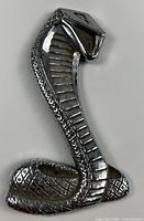 Front view of silvertone Shelby Cobra emblem