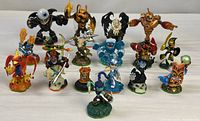 Group shot of entire lot showing 15 character figures arranged in rows