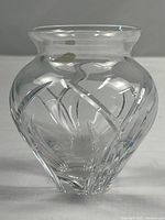 Front view of clear crystal vase showing full shape and cut design