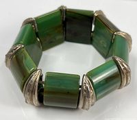 Full bracelet view showing rectangular Bakelite panels and metal spacers