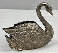 Full view of silver plated swan showing overall form