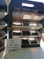Front view showing one organizer with labeled bins of nails and screws