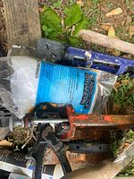 Top view of caulking guns, strainers package and other tools