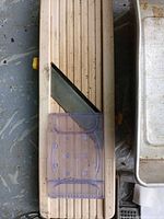 wooden mandoline slicer with plastic guard