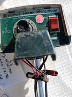 Control panel showing brand label, 15-speed dial, red toggle switch and wiring