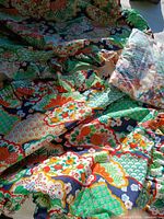 Multicolour floral ruffled bedspread with bagged pillows