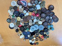 Overhead view showing full assortment of buttons in various materials and colors
