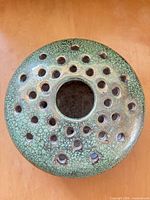Top view showing perforations and crackle glaze finish