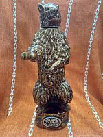 Full view of standing bear ceramic decanter with head lid attached