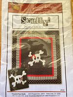 Front of sealed Scully! quilt pattern package showing cover image and branding
