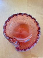 Top view showing ruffled rim and bullicante bubbles