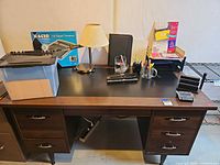 Full view of desk with accessories on top