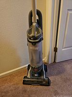 Front view of Hoover upright vacuum showing full unit