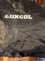 Black Luxcol carry bag front view