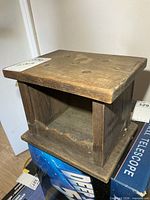 Overall view of the oak pew heater box showing open front and dimensions context