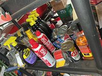 Shelf view with cleaners, additives, reflective tape and hardware