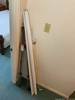 Leaning group showing two packaged rods, bundled blind and boxed trim pieces