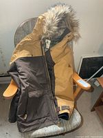 Front view Woods two-tone insulated parka with faux-fur hood