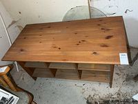 Top and cubby view of solid wood coffee table