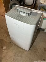 Front three-quarter view of white Noma dehumidifier