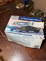 Closed box front and side panels showing Revell Monogram branding and car artwork
