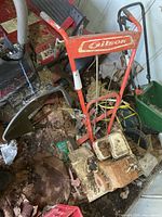 Full view of Gilson rototiller showing frame, handles, tines and attached engine