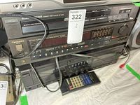 Full stack showing Technics receiver, Electrohome CD player, Nikko cassette deck and remote