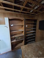 Both shelving units side by side for scale and design comparison