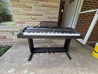 Full view of Kawai digital piano on stand