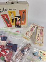 Overall lot: Barbie case, two boxed Skipper dolls, loose Skipper, bagged outfits and accessories