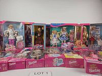 Group view of all twenty boxed Barbie dolls and sets