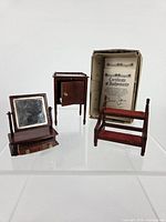 all three Dennis Jenvey miniature furniture pieces with certificate of authenticity