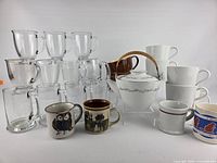 All items grouped showing teapot, stoneware mugs, clear glass mugs and white porcelain mugs