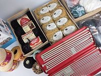Overview showing knitting needle case, Italian Mohair yarn, Red Heart yarn, crochet thread spools and yarn basket