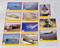 Overview of all 11 Desert Storm trading cards laid out on table