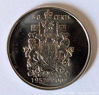Reverse of coin showing Canadian Coat of Arms, denomination and dates
