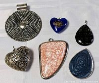 Group shot of all six pendants
