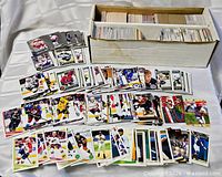 Overview of loose cards spread out and box behind