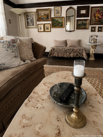 Table in living room showing base, top, plinth