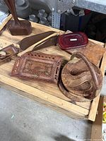 Overview of lot showing nesting basket, inlaid tray, jewelry box, wooden scoop dish, utensils and brass bowl