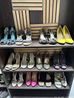 Entire shelving view showing 12 pairs across three rows