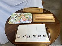 Group view of all trays and trivet on table