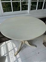 Top view of round antique white dining table