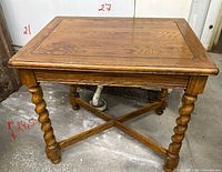 full view of oak barley twist end table showing dimensions noted on image