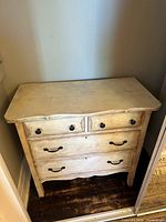 Front and top view of solid wood dresser showing all drawers and hardware