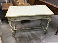 front view showing drawers and legs