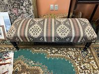 Full top view of upholstered bench showing pattern and leg style