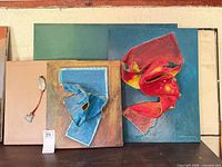 Group view of all four canvases showing colors, sizes and relief elements