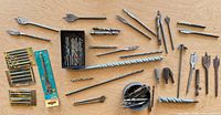Wide layout of all drill, spade, masonry bits, Bosch packs, case and tin