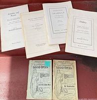 Six opera libretto booklets including Strauss titles and Metropolitan Opera series